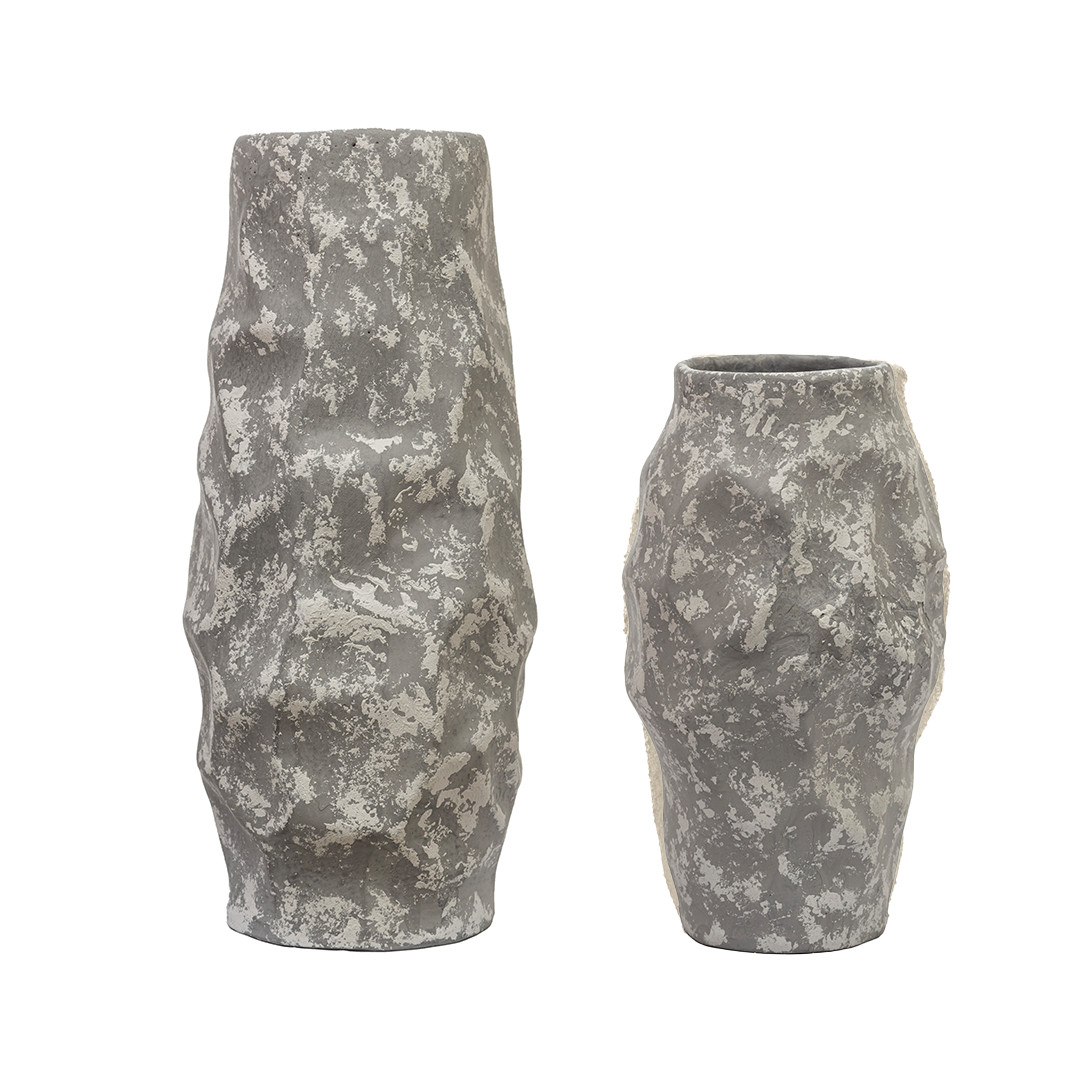 Handcrafted clay accessory vases, textured gray design, perfect for decorative use in any room.