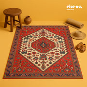 Ravashi - Printed Chenille cotton with Ganga Rug laid on a yellow background with a chair and decorative items.