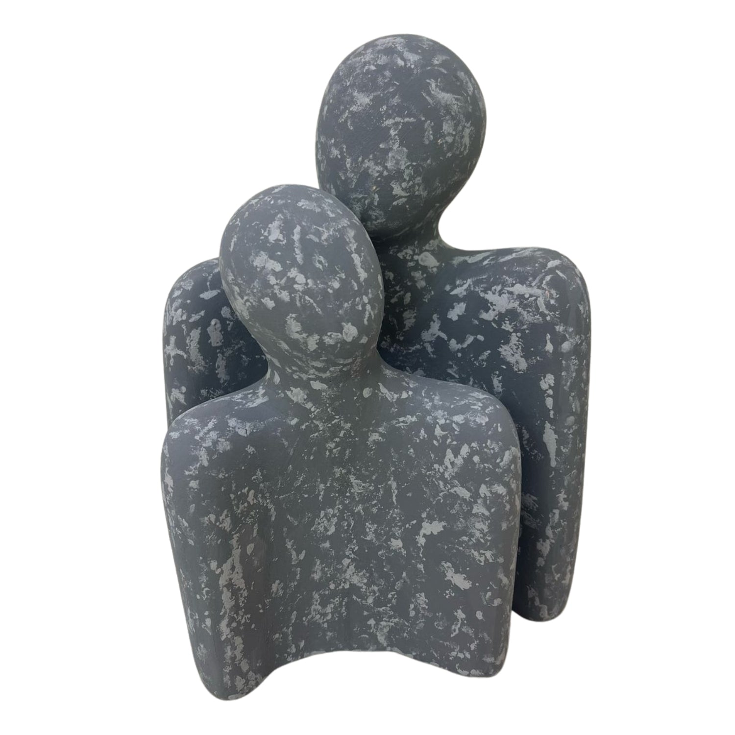 Handcrafted clay accessory showcasing a unique design of two figures, ideal for home decor as a modern clay accessory.