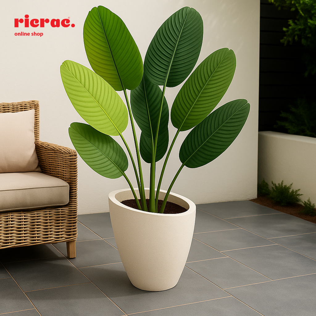 Revera- Fiberglass Pot with lush green leaves displayed in a modern outdoor setting, enhancing the aesthetic appeal.