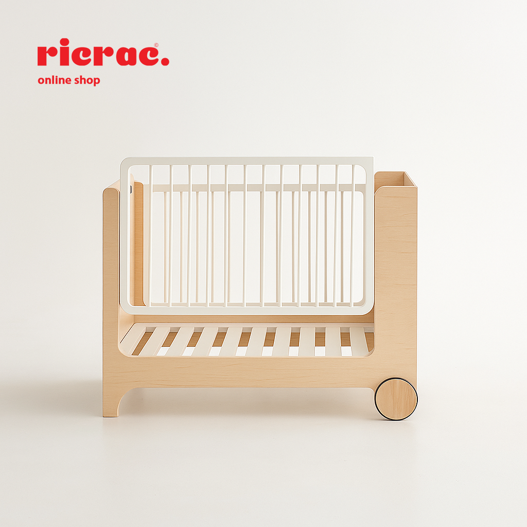 Rolata- Baby Cot Bed with elegant design and wheels for easy mobility, showcasing wood finish and safety features.