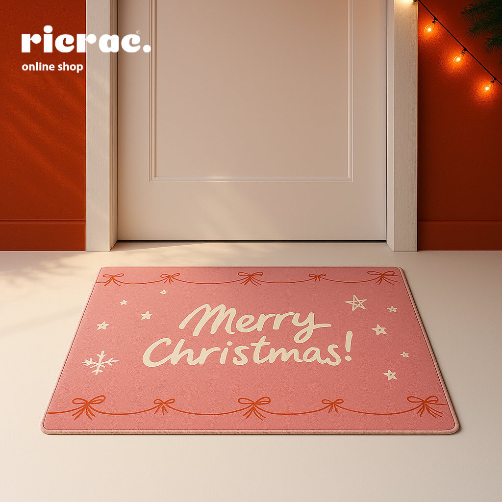 Rarosy- Christmas Door Mat featuring a festive 'Merry Christmas!' design in pink with bows and snowflakes.