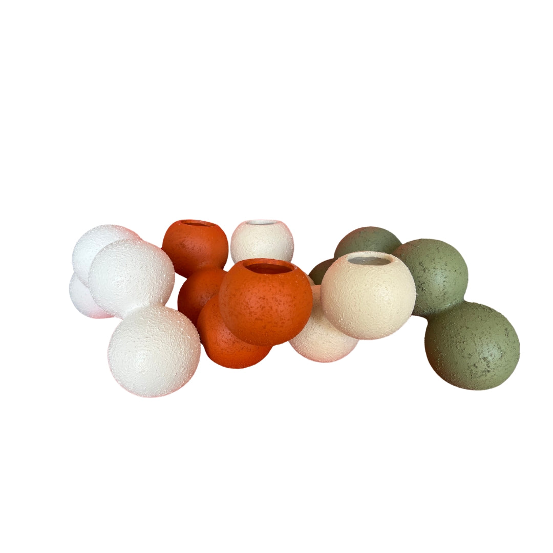 Rondo- Clustered Orb Clay Vase designed with interconnected colorful orbs in various sizes and textures.