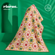 Ruximo Printed Kilim blanket featuring vibrant patterns, perfect for adding warmth to any living space.