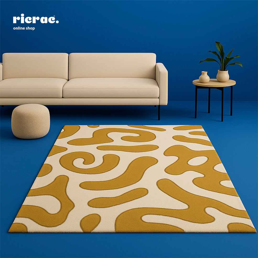 Razzo hand tufted rug with playful design in a modern living room setting against a blue backdrop.
