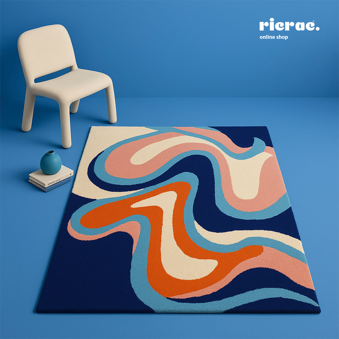 Hand tufted rug with bold curves and colors, perfect for modern interiors.