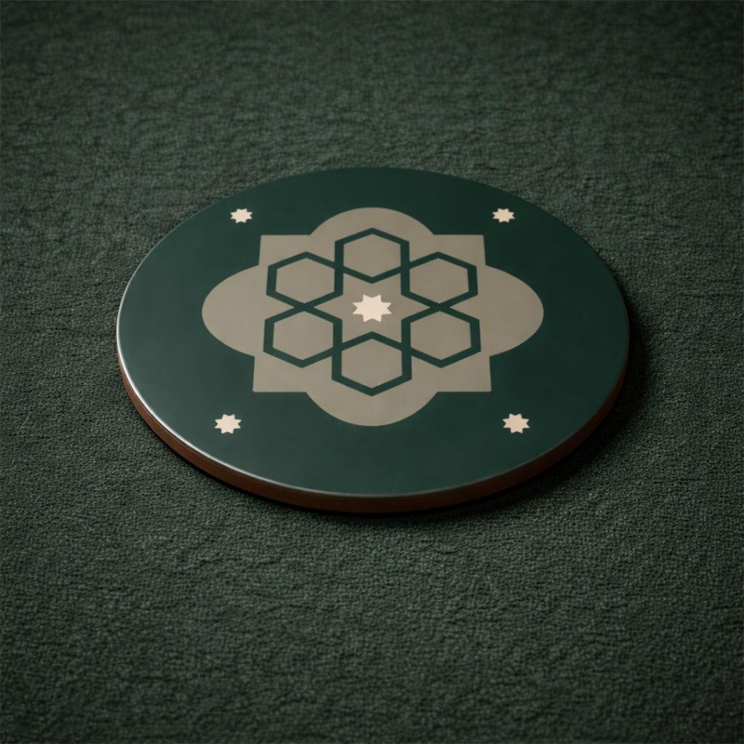 Arabesque pattern coasters in green, featuring decorative designs and protecting surfaces from drink marks.