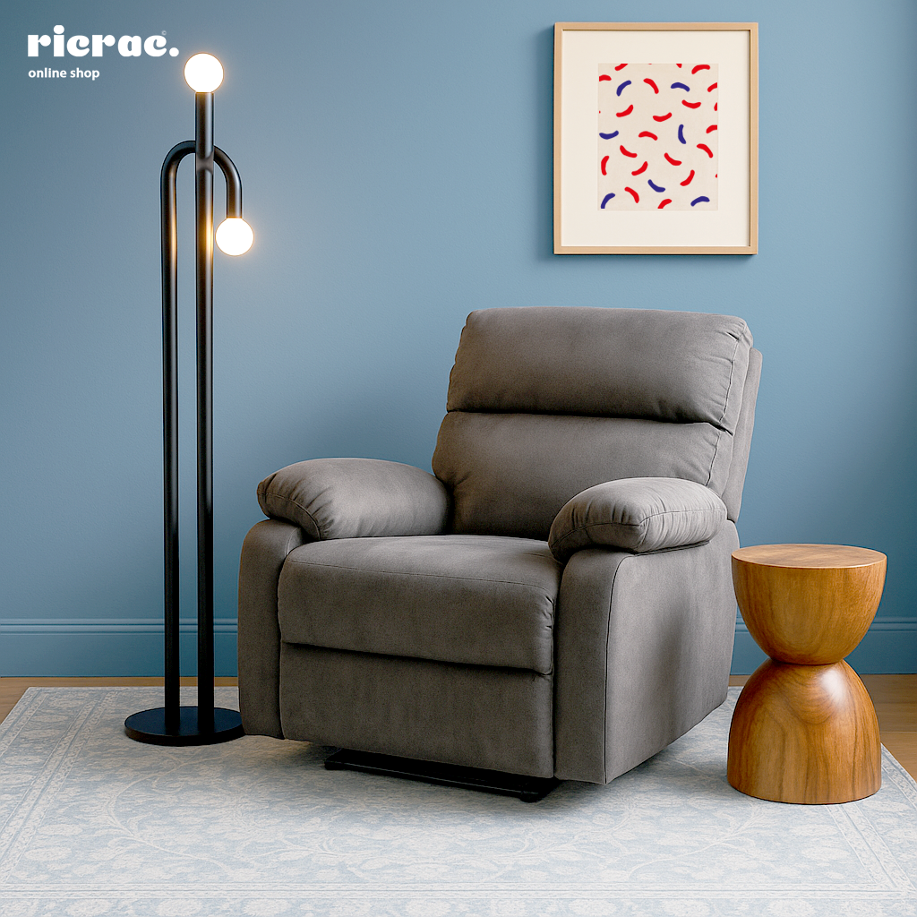 Ravella- Metal Lighting Unit with modern gray recliner and wooden side table in a stylish living room setting.