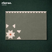 Waterproof Placemats featuring an Islamic pattern with floral motifs on a green background.