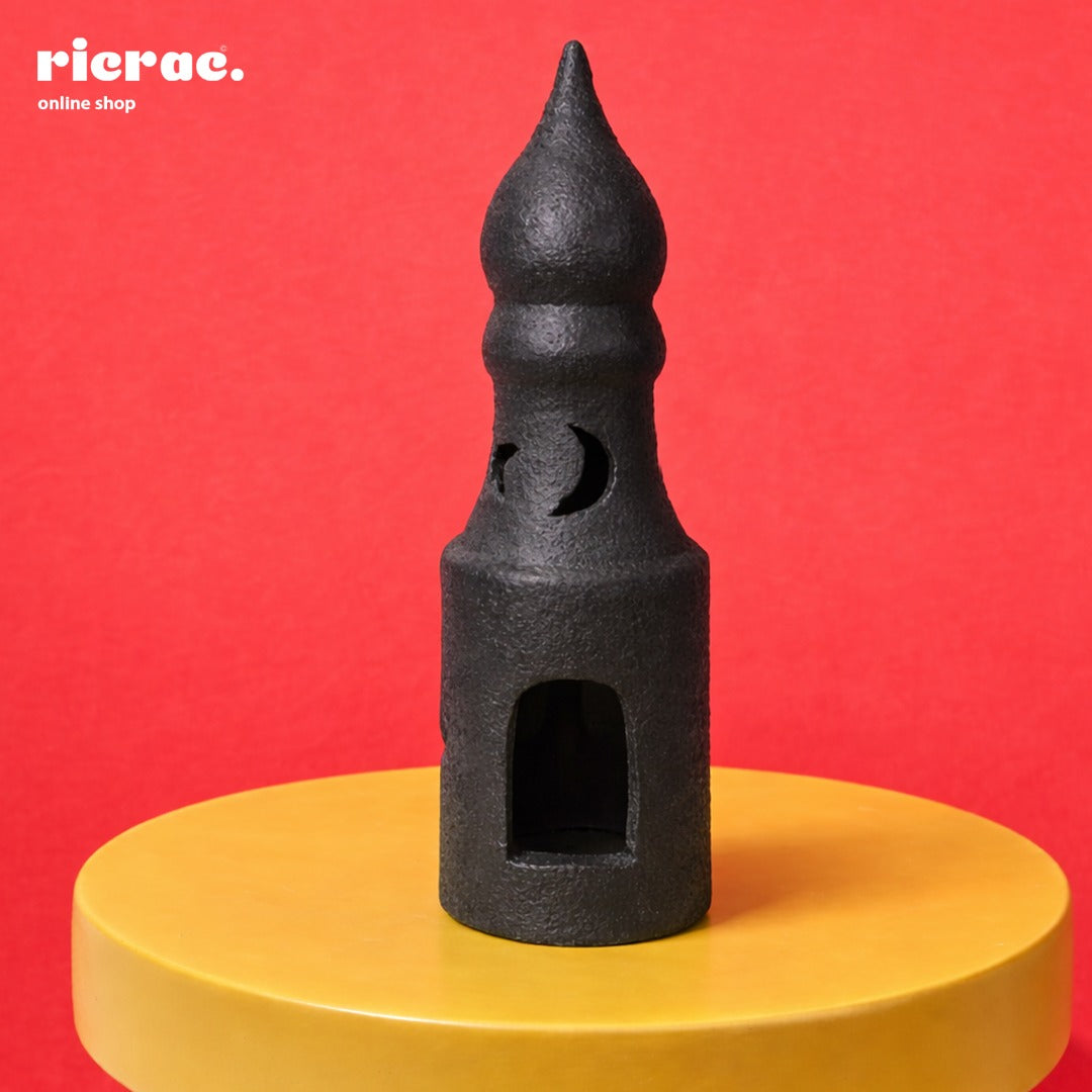 Raleema- Ramadan Clay Accessory displayed on a yellow table against a red background, showcasing modern decor.