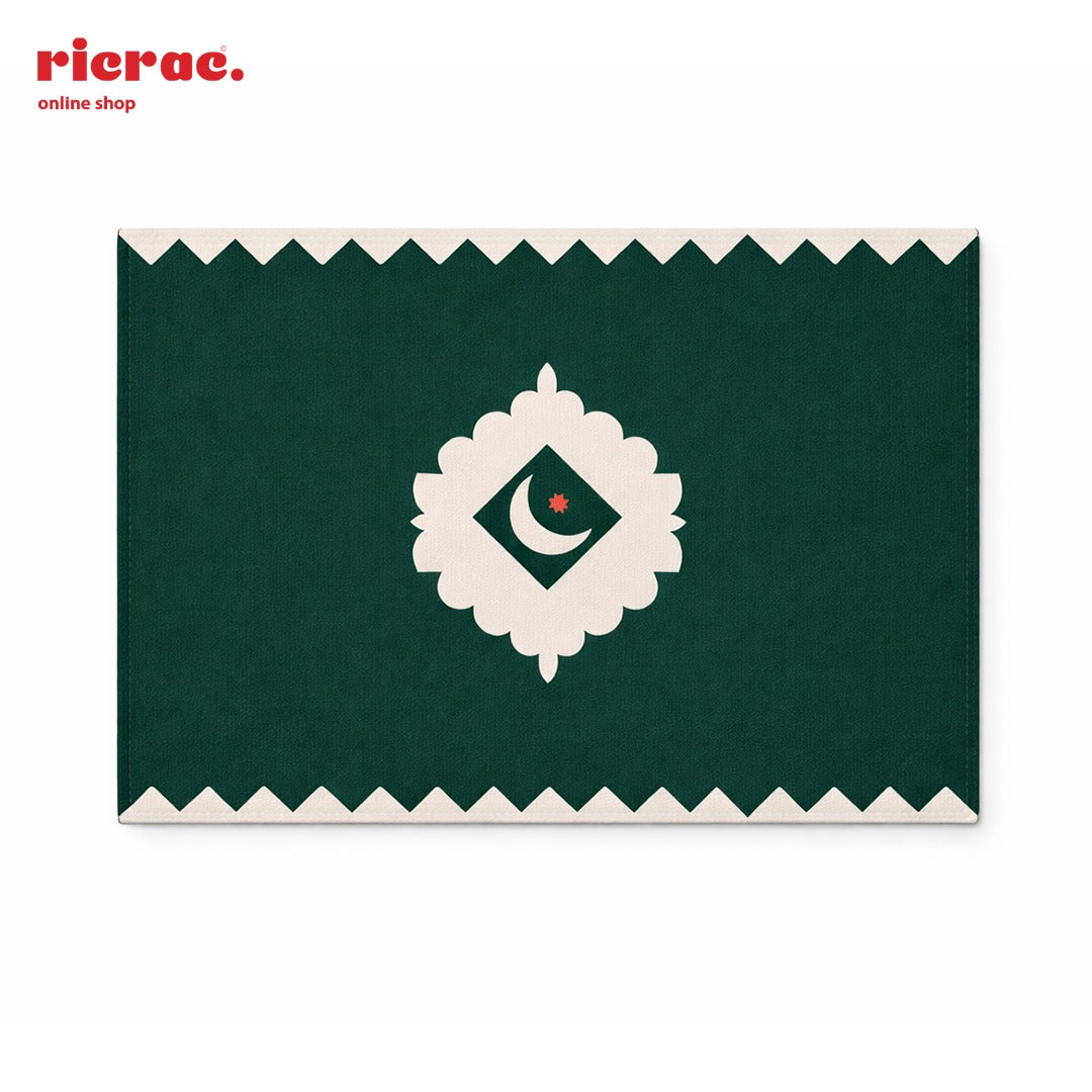 Waterproof placemats featuring a green design with a crescent moon and star motifs for stylish table settings.