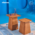 Rolat- Side Table shown with decorative items on a stylish background, showcasing its sleek design.