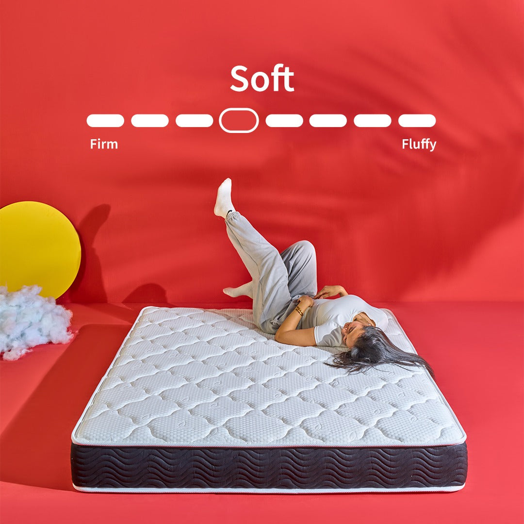 Super Soft Foam Single Layer Pocket Spring Mattress displayed with a person demonstrating its softness on a red background.