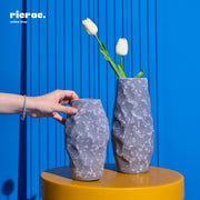 Handcrafted clay accessory vases with tulips, perfect for home decor. Elevate your space with this unique clay accessory.