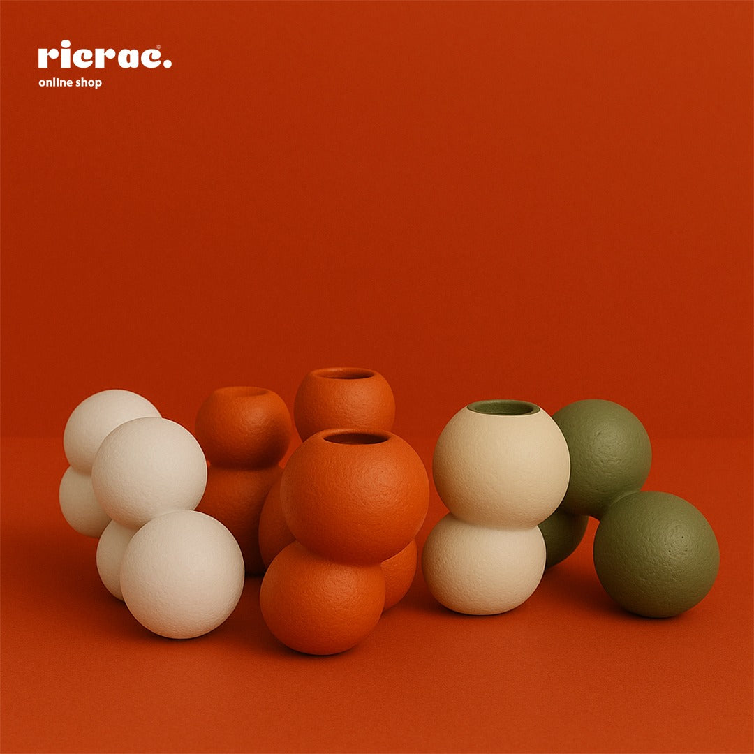 Rondo- Clustered Orb Clay Vase arrangement with colorful orbs on a vibrant background.