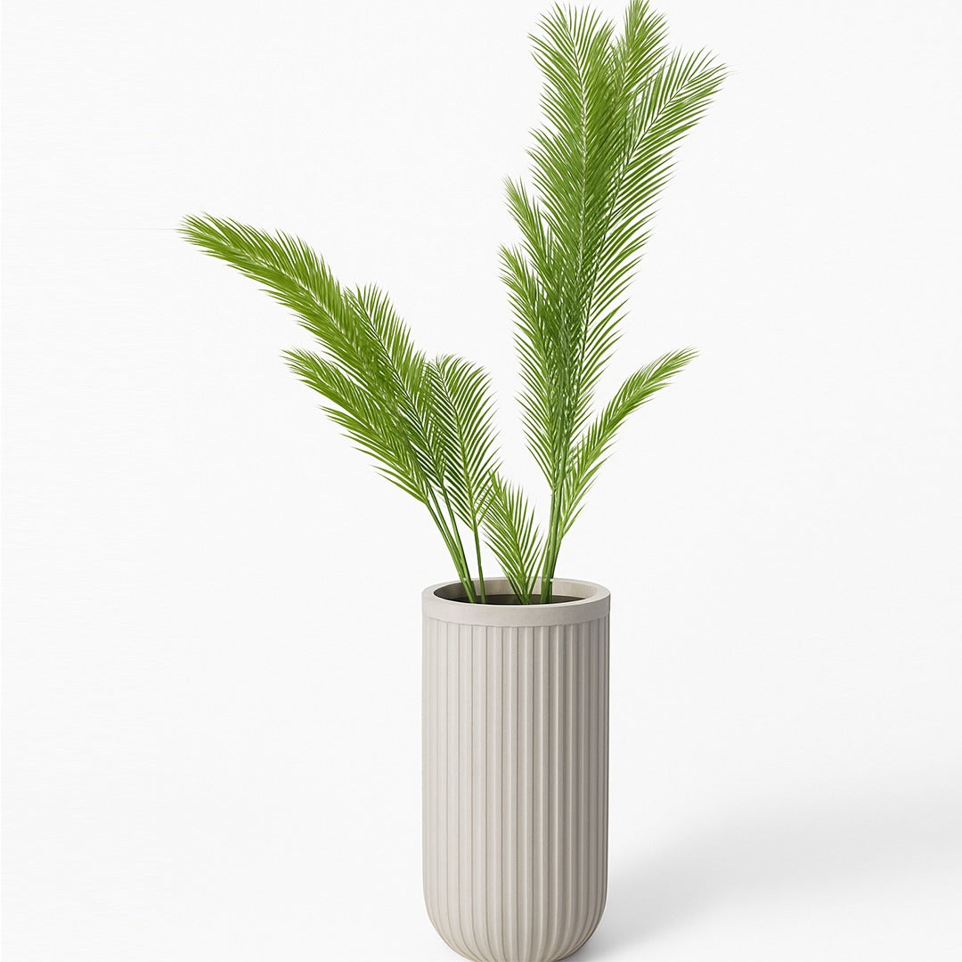 Ritano Fiberglass pot with green foliage, showcasing fluted design and textured elegance.