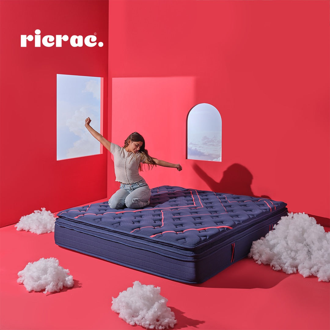 Royal Double Layer Memory Foam & Natural Latex Pocket Spring Mattress in a vibrant room with a child enjoying comfort.
