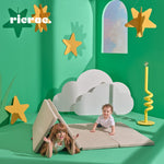 Children playing on the Rolata- Kids' Foldable Play Mat in a fun, colorful room with playful decor.