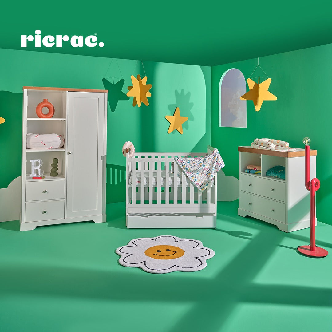 Rakala- Full Set Room featuring a cot bed, wardrobe, and changing table in a colorful nursery setting.