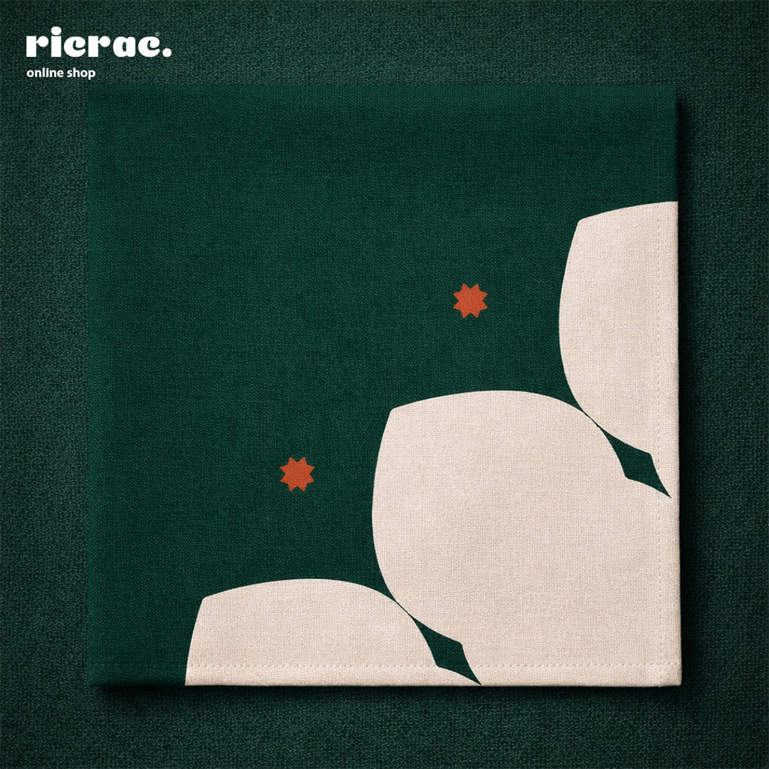 Waterproof cutlery napkins with Islamic patterns featuring orange star motifs on a green background.