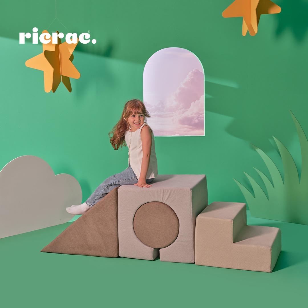 Girl playing on the Refanda multi functional kids play set, designed for creative and active play in a colorful environment.