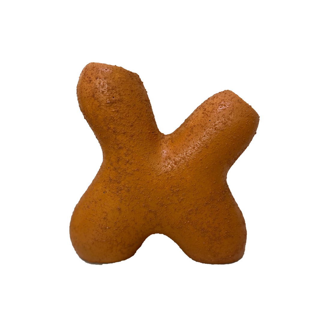 Renzal Clay Accessory, a handcrafted decorative piece in a warm orange hue.